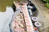 Onion laden lorry plunges into river from Kulur bridge; none hurt